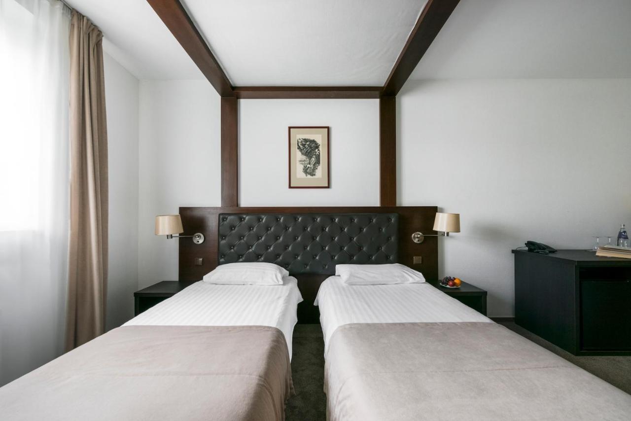 Amberton Cozy Hotel Kaunas Extérieur photo